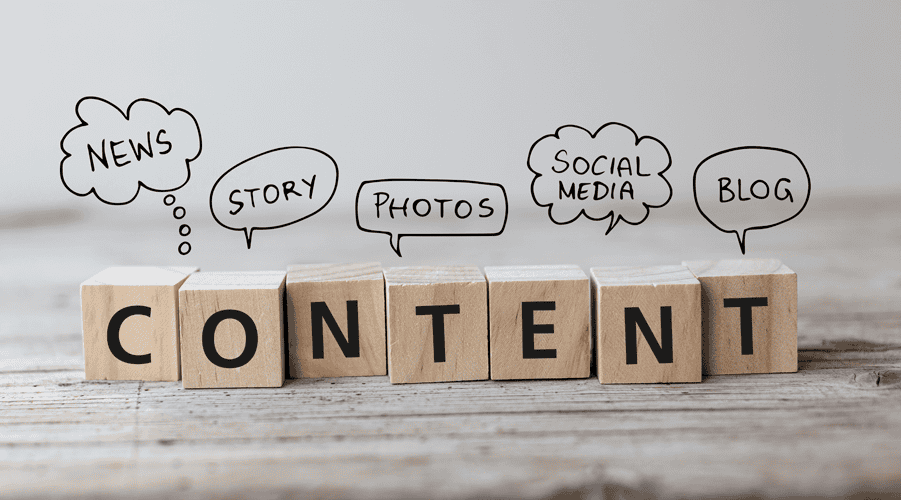 Wooden blocks spelling the word "content" with story bubbles over them